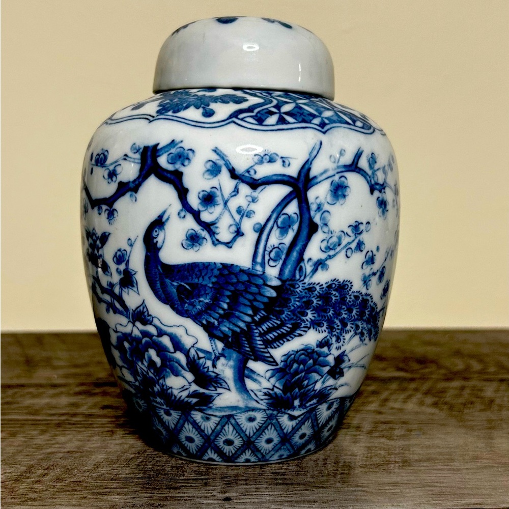 Small vintage ceramic blue and white peacock vase, with lid.  Made in Japan.
